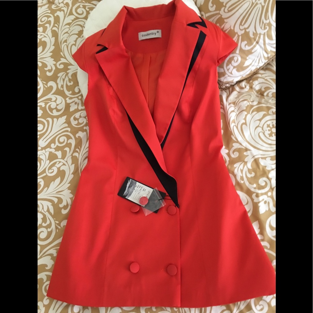 Sleeveless orange vest by Codentry